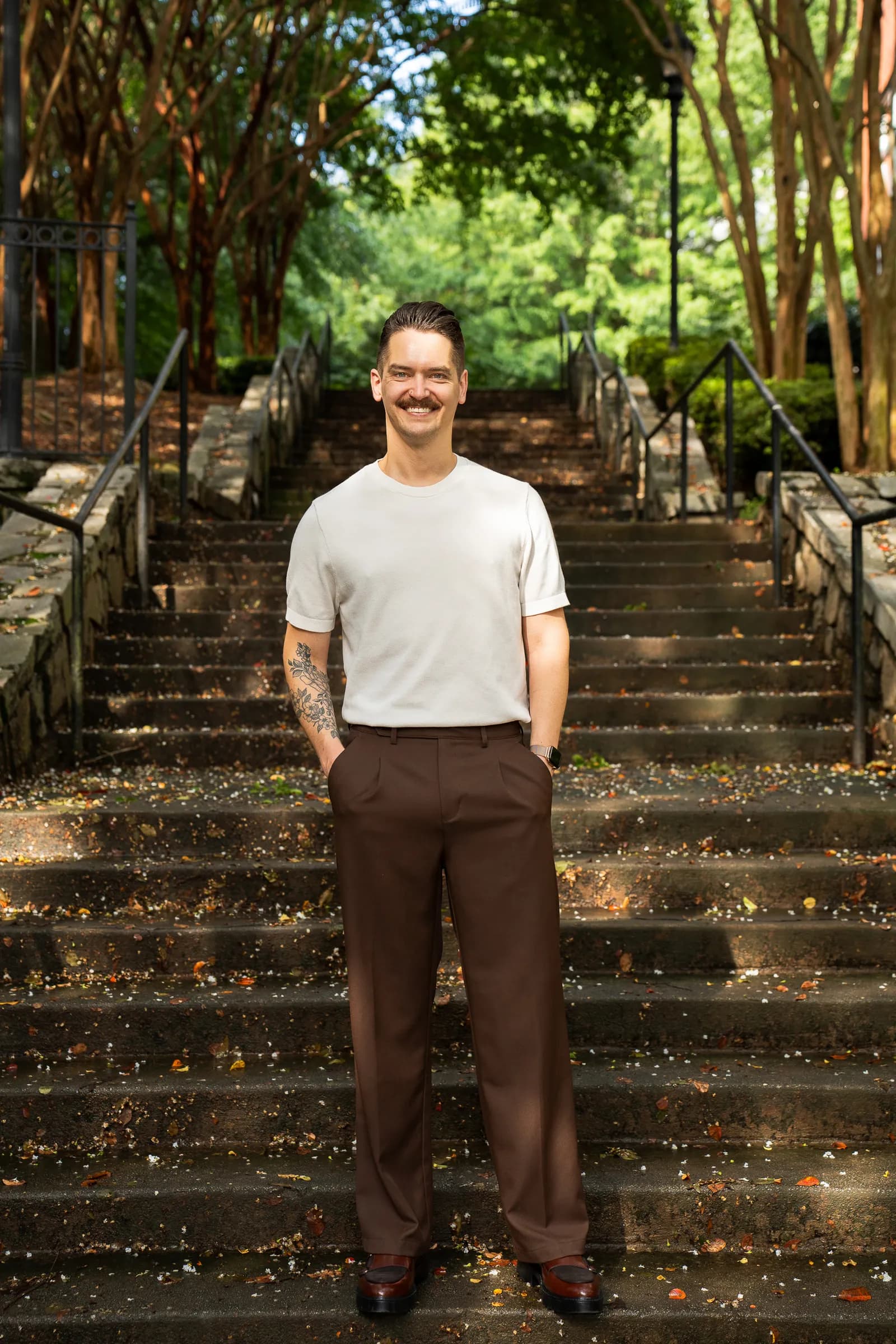 Cory Klose on a tree-canopied intown Atlanta staircase